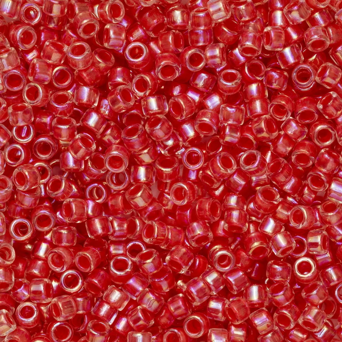 TOHO-perler 11/0 – 779 Salmon lined rainbow crystal